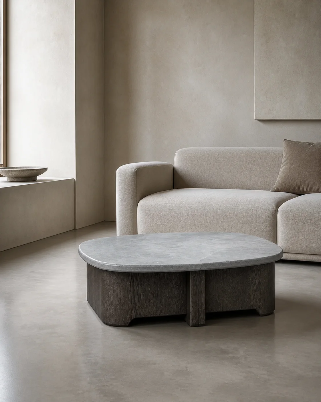 Slate Oak Low Table in a calm contemporary living room with a pale stone top and smoked oak base