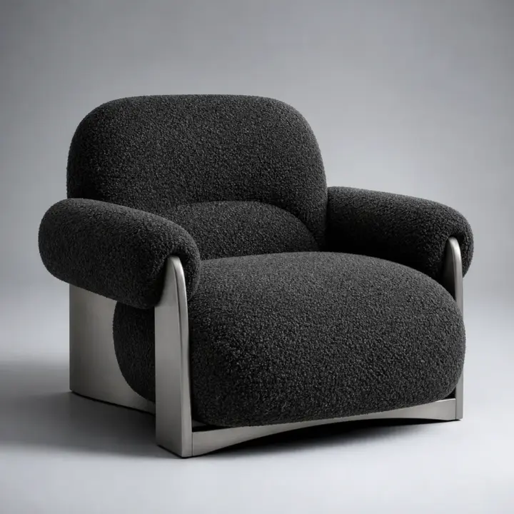 Charcoal boucle lounge chair with brushed metal supports