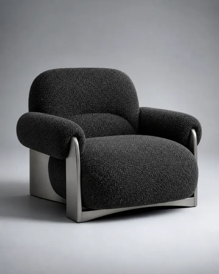 Charcoal boucle lounge chair with brushed metal supports